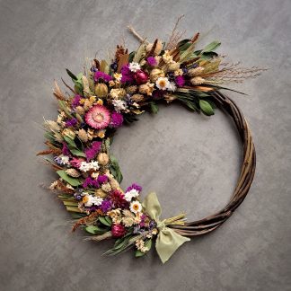 Willow wreath with a splash of purple