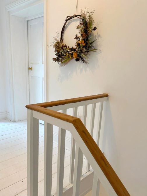 K&Ns house wreath wall